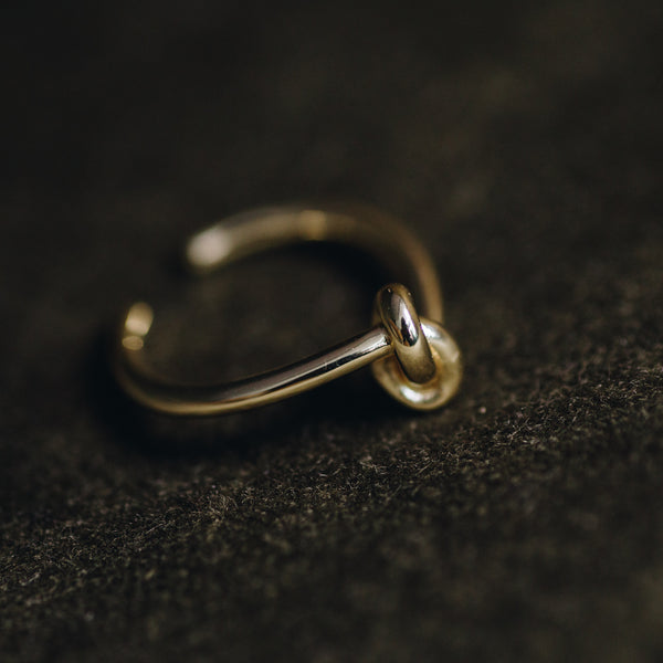 Le Noeud adjustable knot ring in 14K gold plated on hand