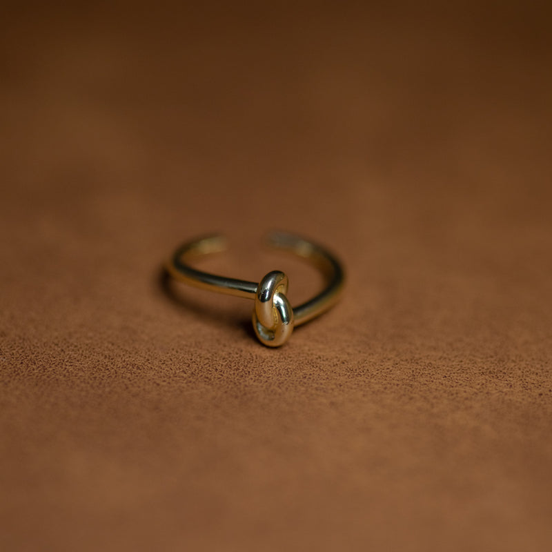 Le Noeud adjustable knot ring in 14K gold plated on hand