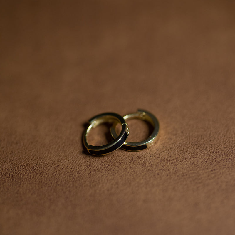 Angela hugger hoop earrings in 14k gold or rhodium with black resin accent