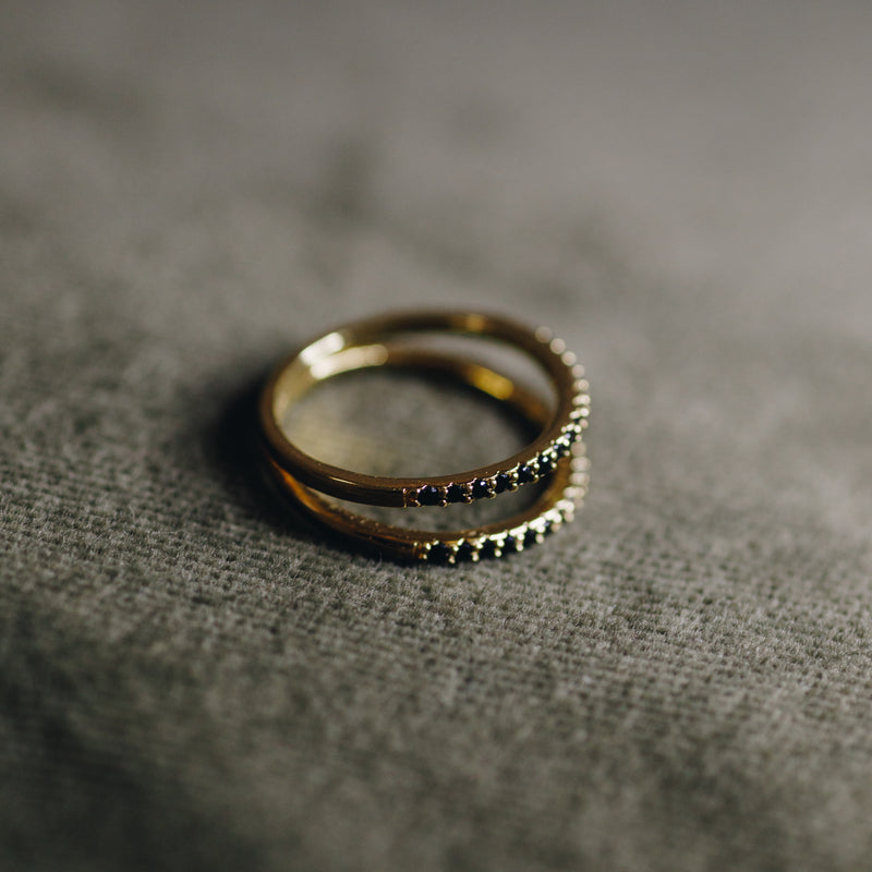 Klara ring with twin 18k gold plated bands and black cubic zirconia stones